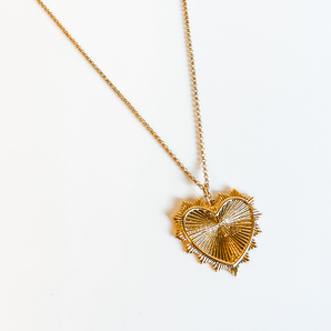 Sharp scalloped heart charm